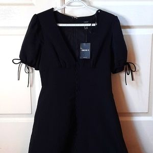 NWT Forever 21 Empire style black dress. Size M.